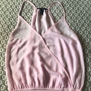 Baby pink body suit.